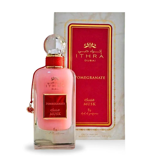 Ithra Dubai Pomegranate Musk perfume bottle and packaging on a white background
