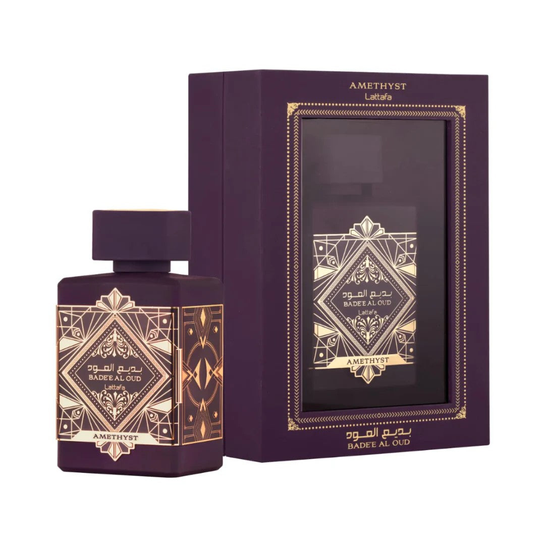 Purple perfume bottle and packaging with geometric designs on a white background